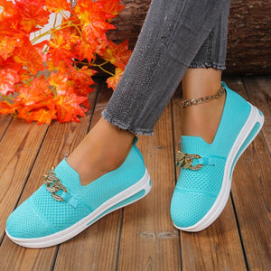 Sky blue mesh slip-on flats with chunky chain detail and white soles