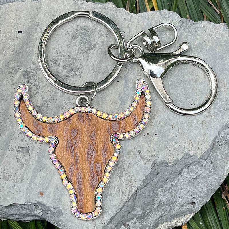 Textured bull head keyring with crystals and silver hardware.