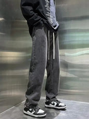 Men's vintage-inspired loose-fit gray denim jeans with drawstring waist