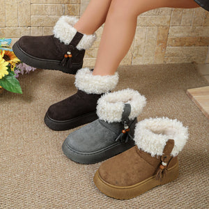 boots in dark brown featuring round toe and ankle boot fit
