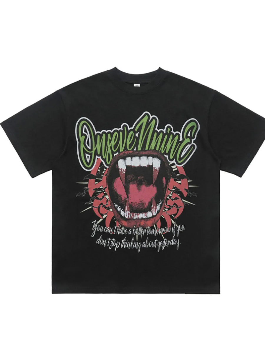 Black 100% cotton oversized t-shirt with graphic of open mouth with fangs and text.