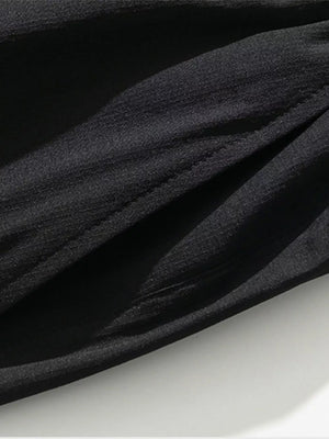 Black cargo capris with adjustable drawstring detail