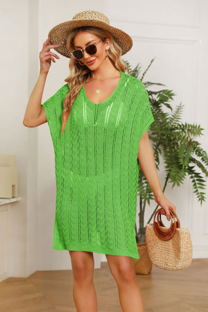 Green open-knit beach cover-up dress with V-neck and short sleeves.