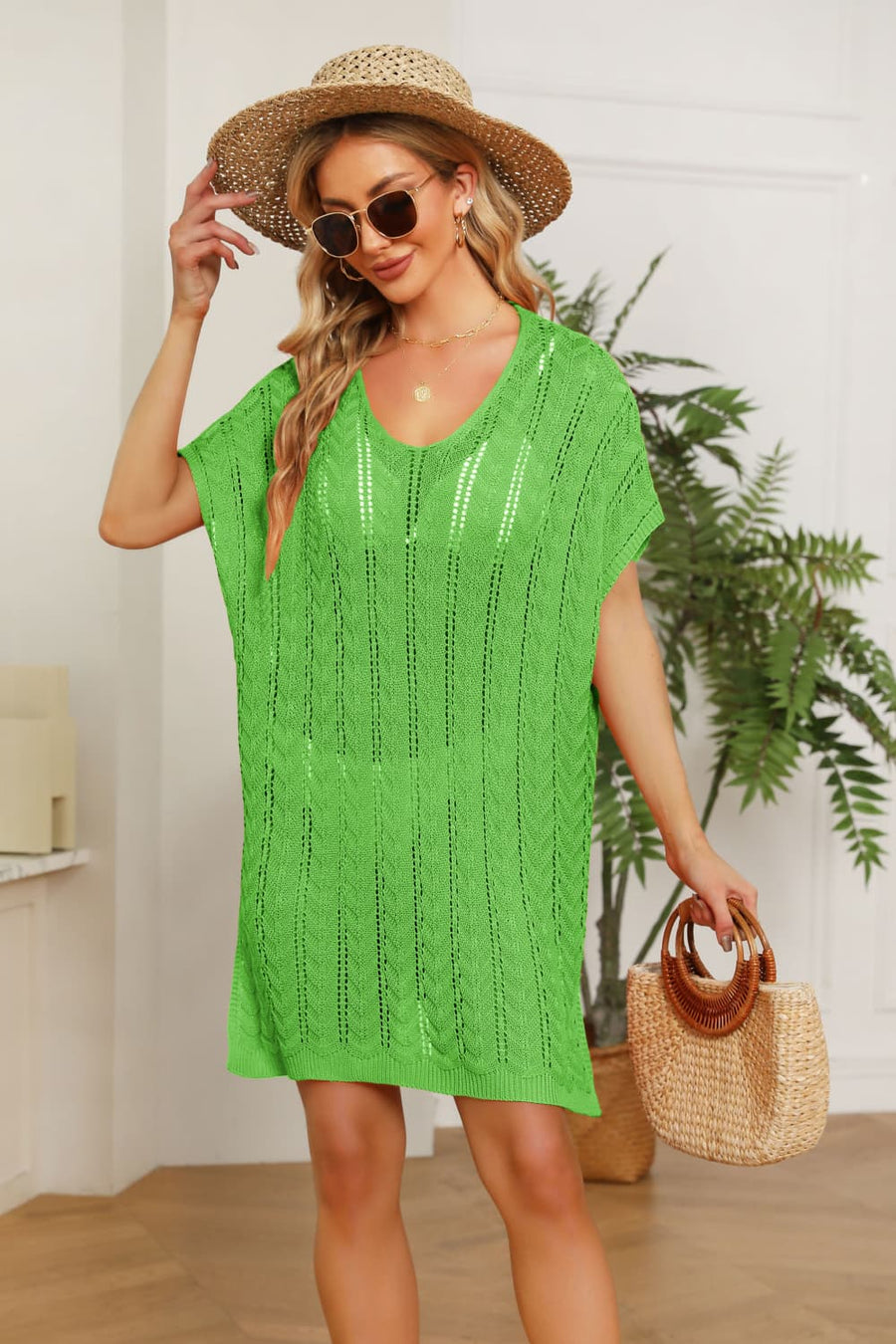 Green open-knit beach cover-up dress with V-neck and short sleeves.