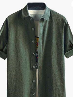Men's green casual button-down shirt with rolled sleeves and a cotton blend fabric.