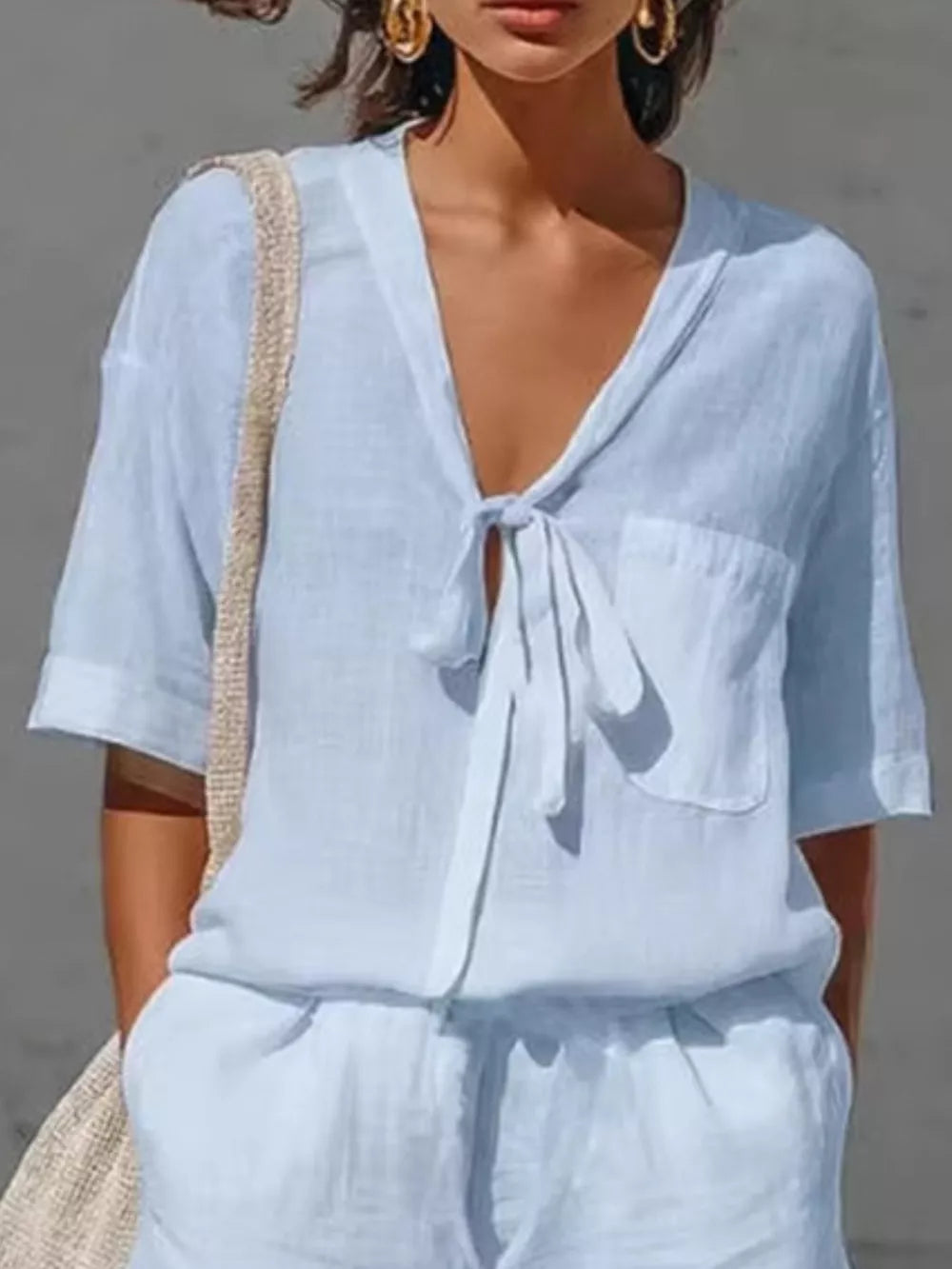 100% polyester Care instructions: Machine wash cold two-piece set in White with relaxed silhouette