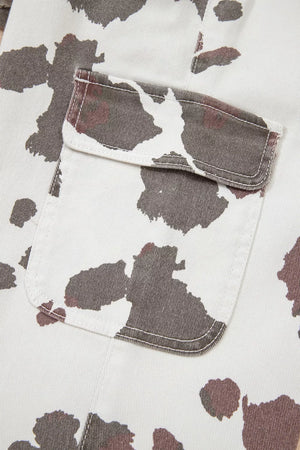 Cow print utility jeans with cargo pocket detail.