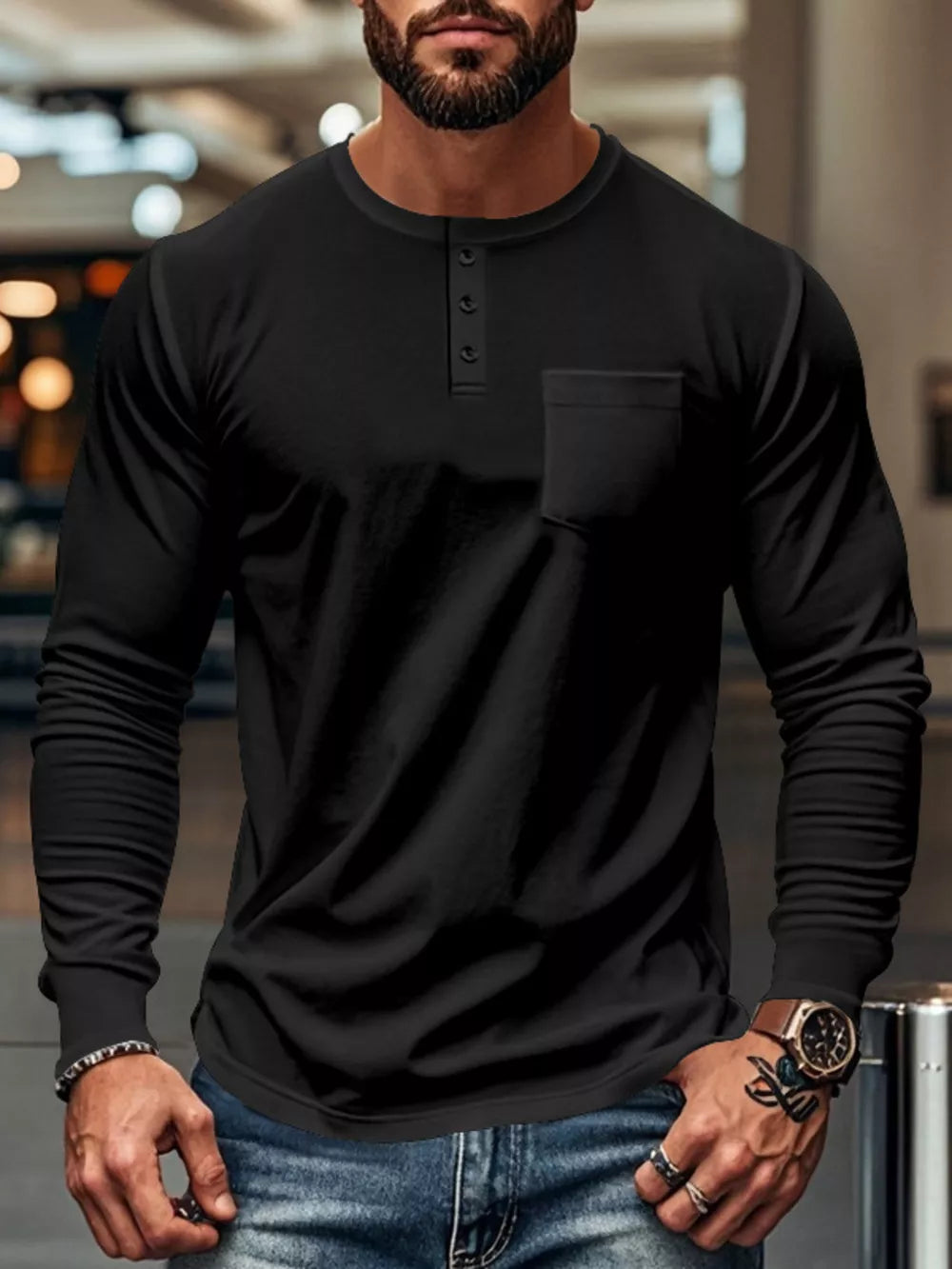 Black long sleeve henley t-shirt with chest pocket and button placket.
