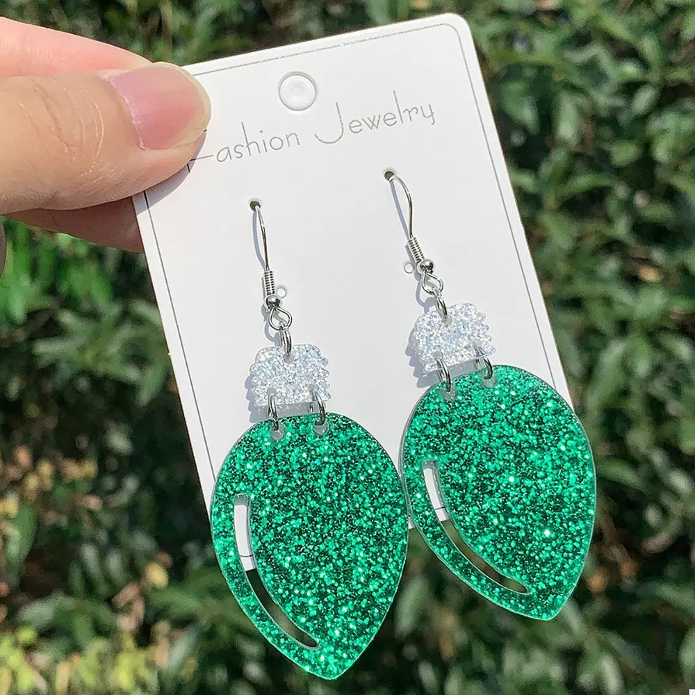 Alloy, Acrylic, Silver-plated Care instructions: Avoid wearing during exercise, earrings in emerald green with drop