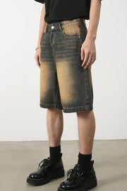 Two-tone washed denim bermuda shorts in olive brown with a faded effect.