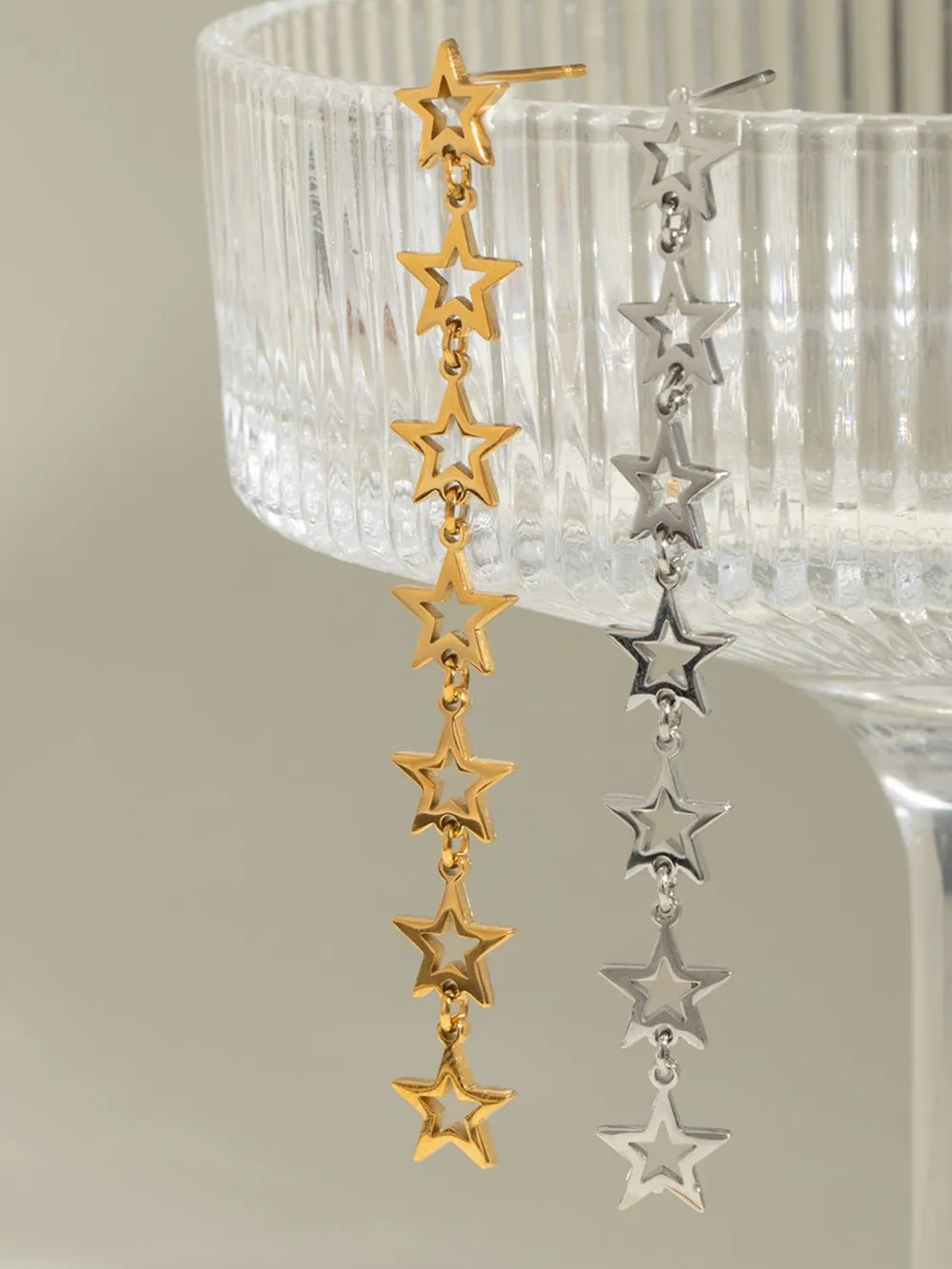 Gold and silver celestial cascade star dangle earrings