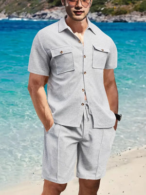 Textured gray resort shirt and shorts set with button front and drawstring waist.