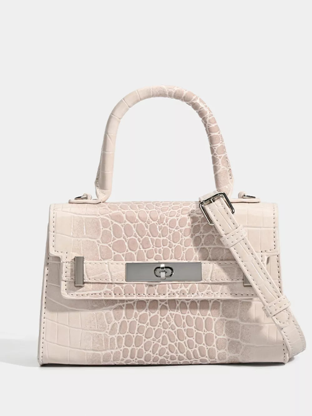 Off-white croc-embossed small tote bag with silver hardware and adjustable strap.