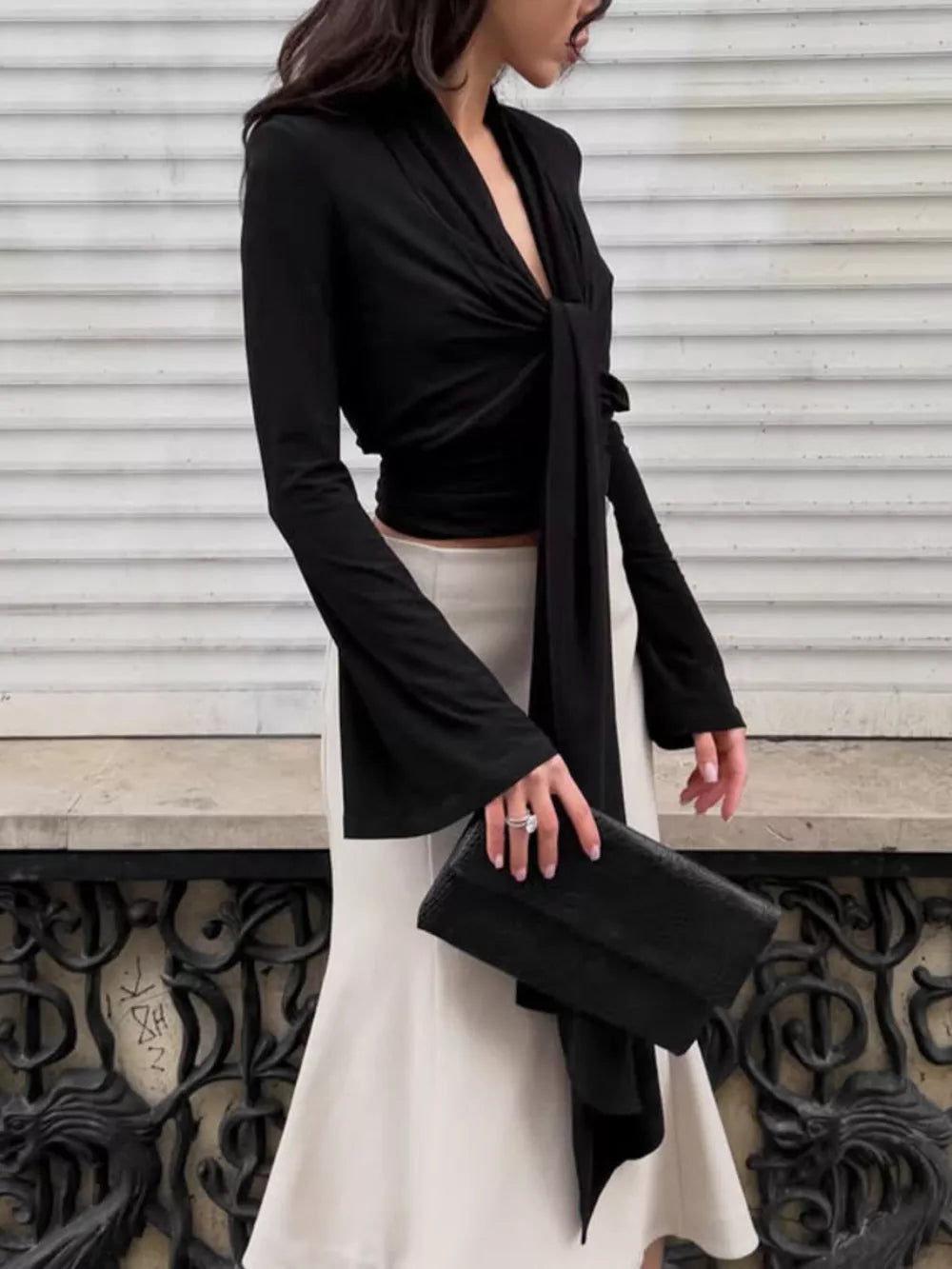 blouse in black with tied and waist-length