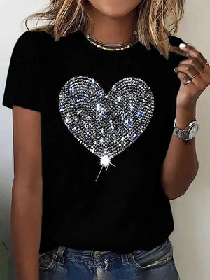 Black t-shirt with a large sparkly heart graphic on the front.