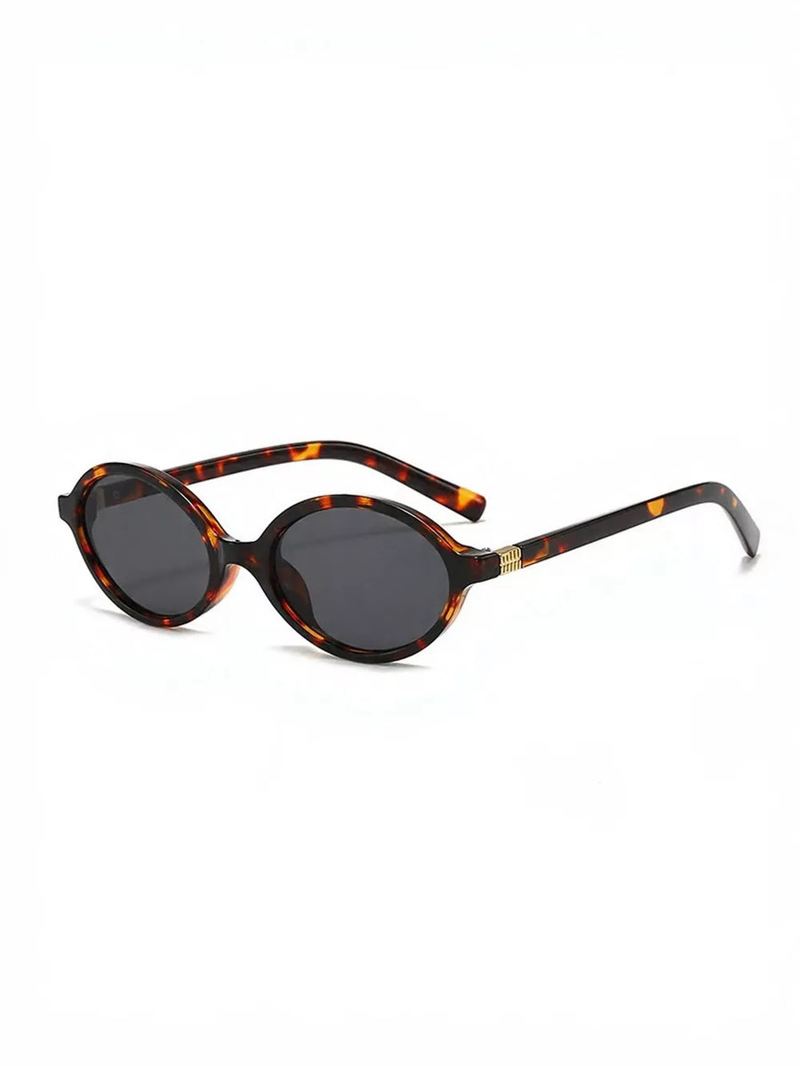 Tortoiseshell oval frame sunglasses with dark lenses and gold accents on the temples.