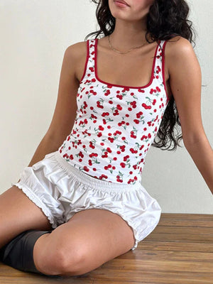 White square neck tank top with red cherry print and red trim
