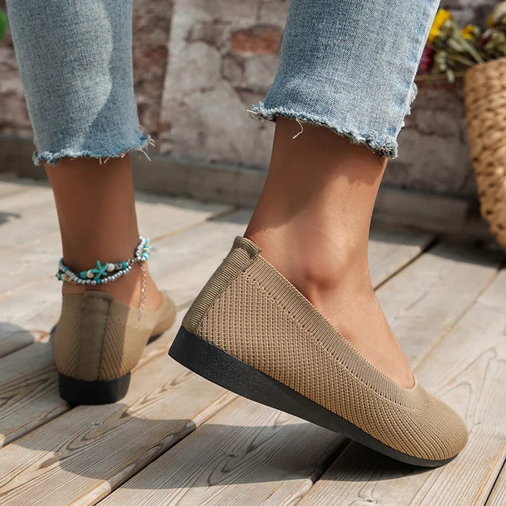 Khaki textured knit slip-on flats with a low heel and round toe.