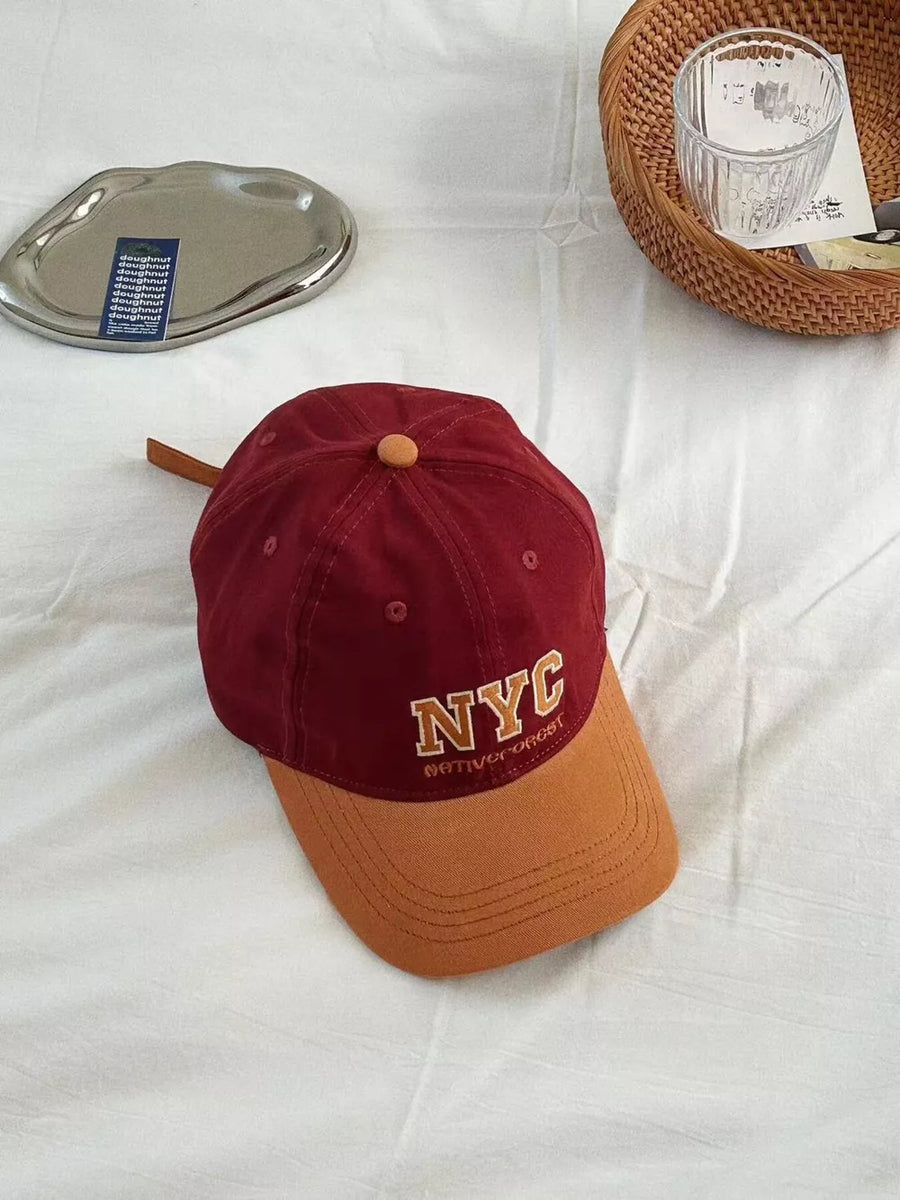 Wine red and tan cotton baseball cap with NYC embroidery