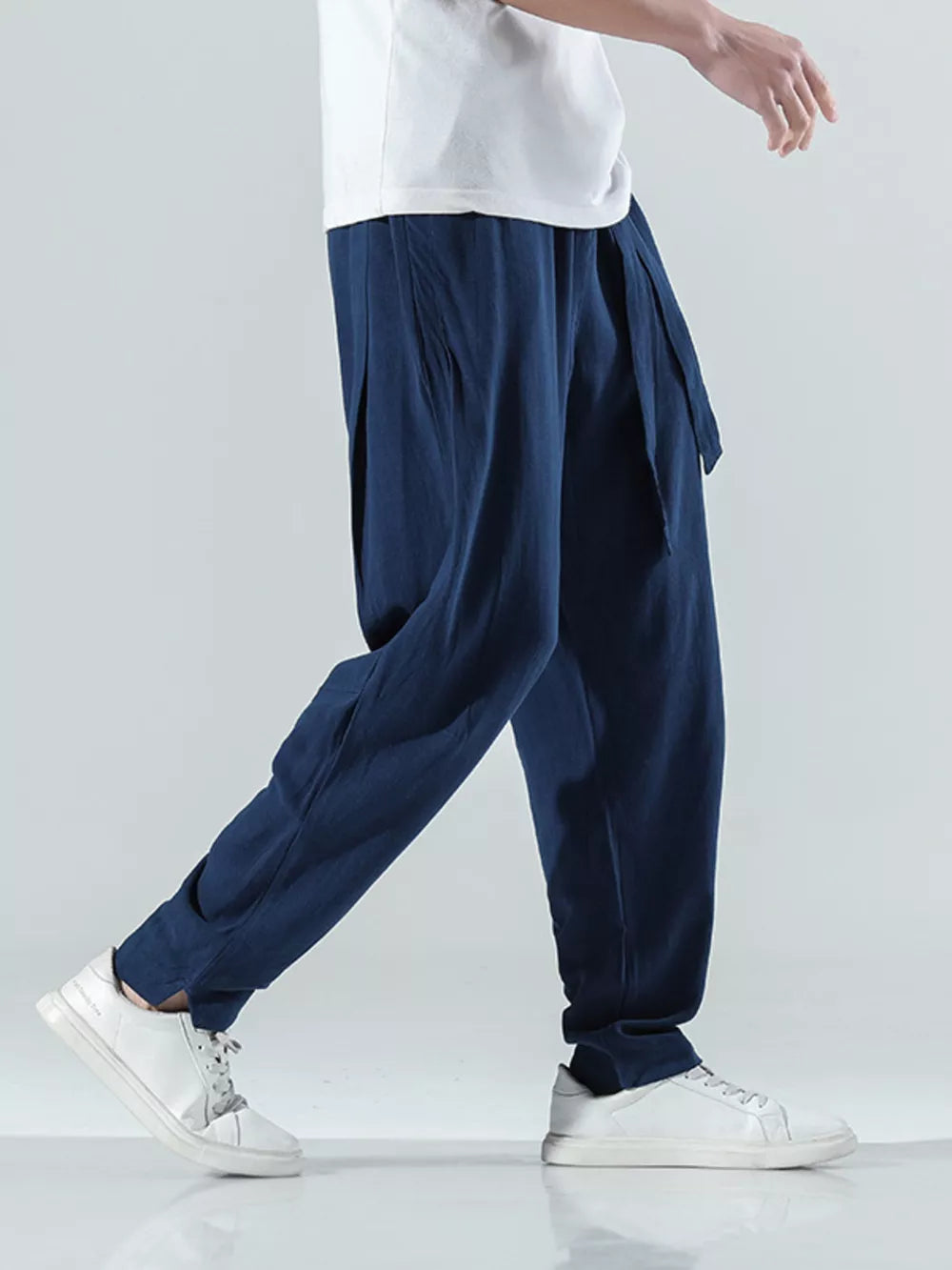 Men's navy relaxed fit casual pants with tie waist detail