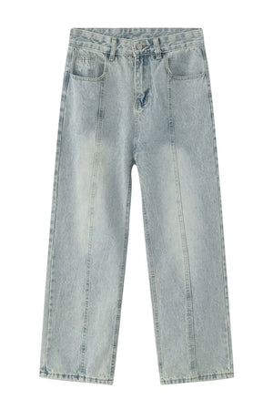Light wash denim jeans with vertical seam detail and straight leg cut.