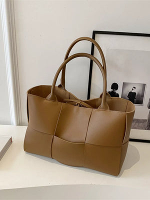 Brown woven PU leather large tote bag with double handles.