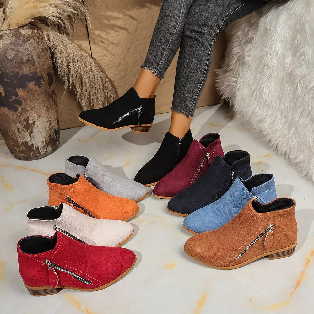 boots in black featuring point toe and ankle boot fit