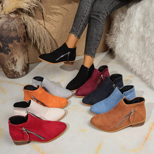 boots in black featuring point toe and ankle boot fit