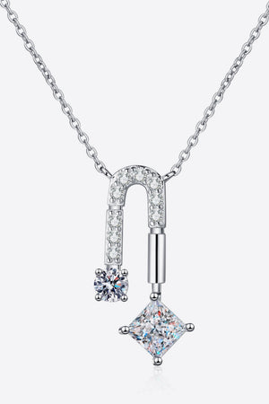 Silver geometric moissanite pendant necklace with clear cubic zirconia stones.