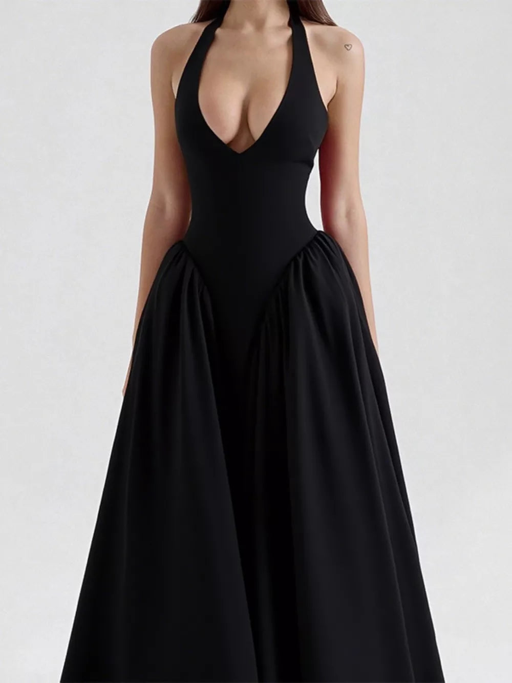 Black halter neck midi dress with deep V-neck and voluminous skirt