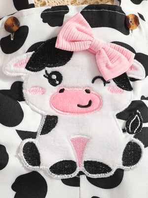 white jumpsuit featuring ribbed and cow print