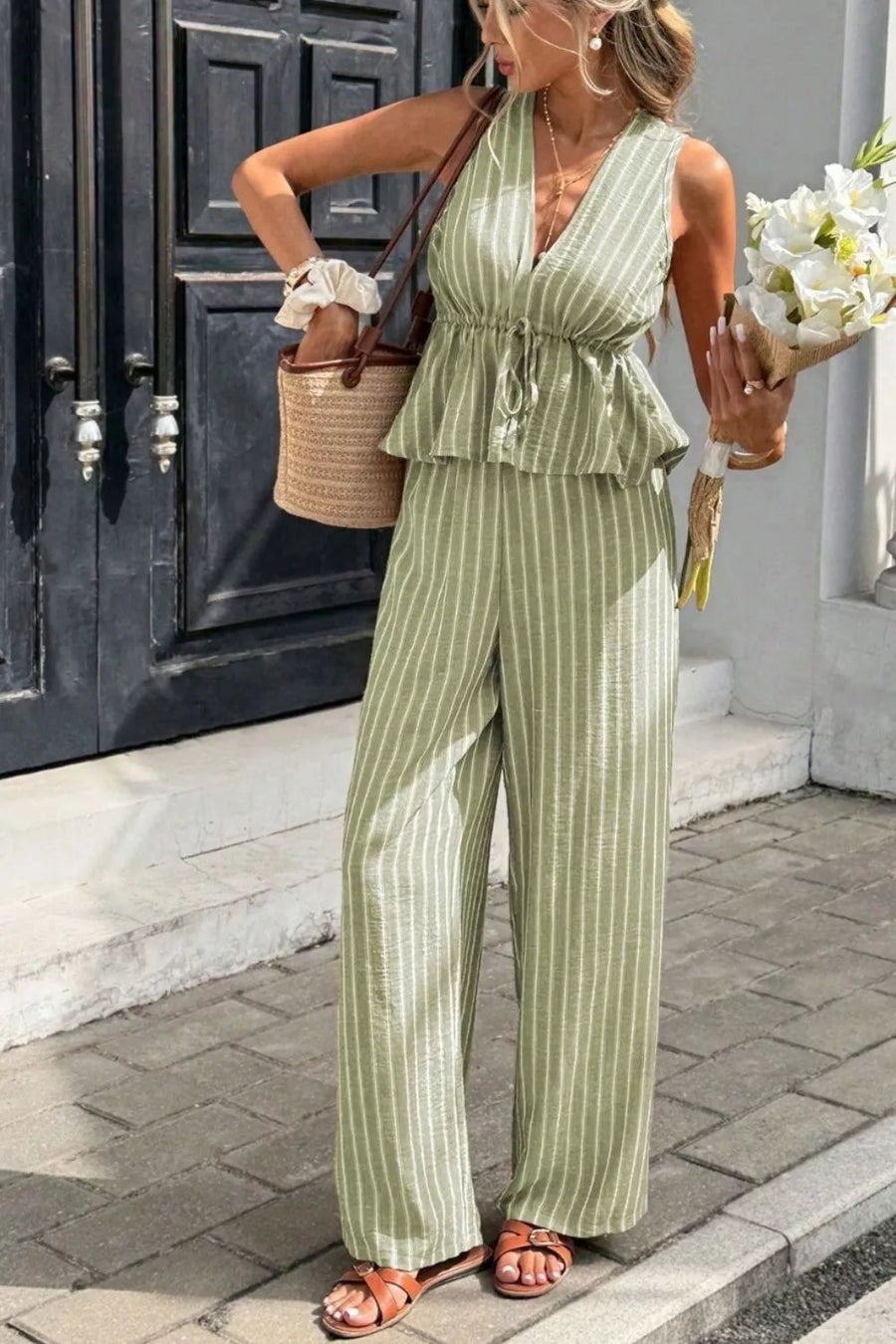 Sage striped two-piece set with peplum top and wide-leg pants