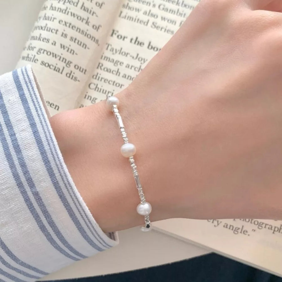 silver bracelet with wrist-length and lobster clasp