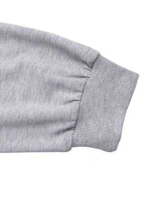 Gray sweater sleeve with ribbed cuff and gathered detail