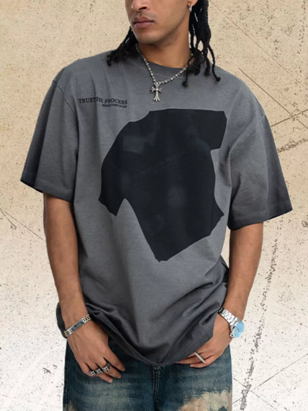Men's grey cotton blend t-shirt with distressed graphic print and text detail.