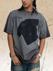 Men's grey cotton blend t-shirt with distressed graphic print and text detail.
