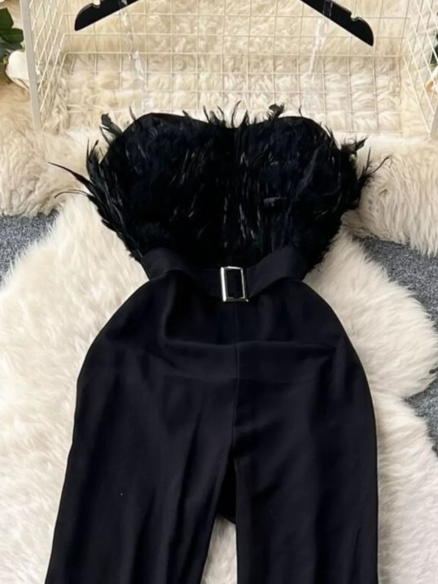 Black strapless wide-leg jumpsuit with feather trim and belted waist