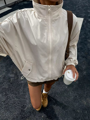 Apricot windbreaker with hip-length and zip-front