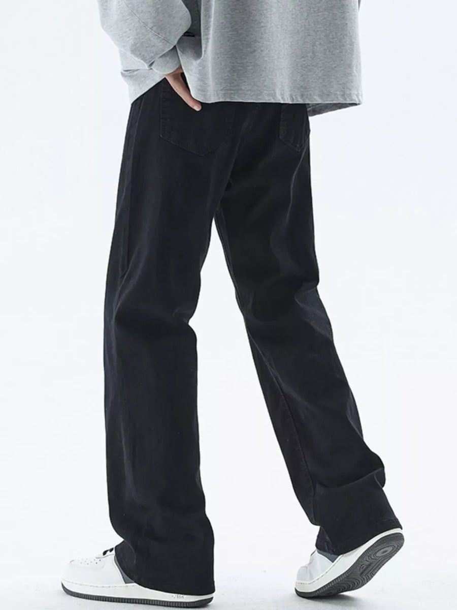 Black relaxed fit cotton jeans for men with a straight leg cut.