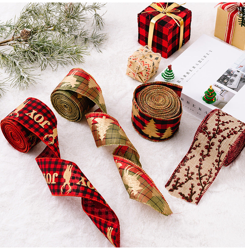 Festive holiday ribbons in red plaid with JOY and deer, green plaid with trees, and burlap with berries.
