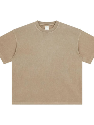 Oversized washed cotton crewneck t-shirt in beige with a relaxed fit and crew neckline.
