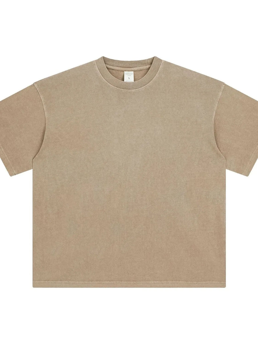 Oversized washed cotton crewneck t-shirt in beige with a relaxed fit and crew neckline.