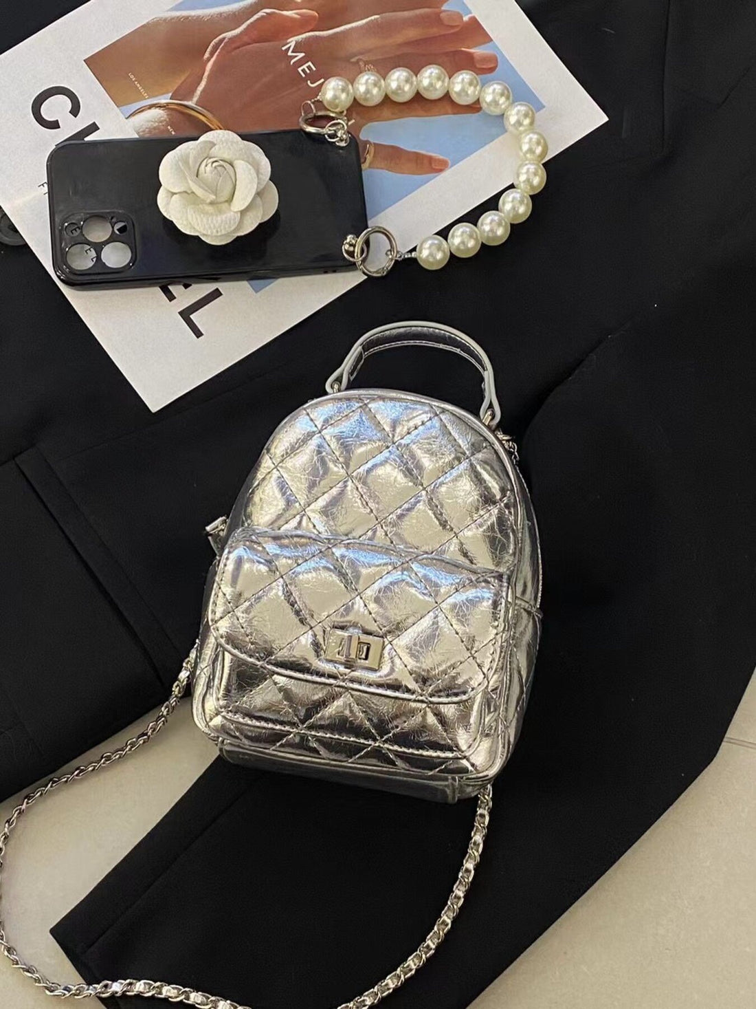 backpack featuring quilted in black with PU Leather Imported Size &amp texture