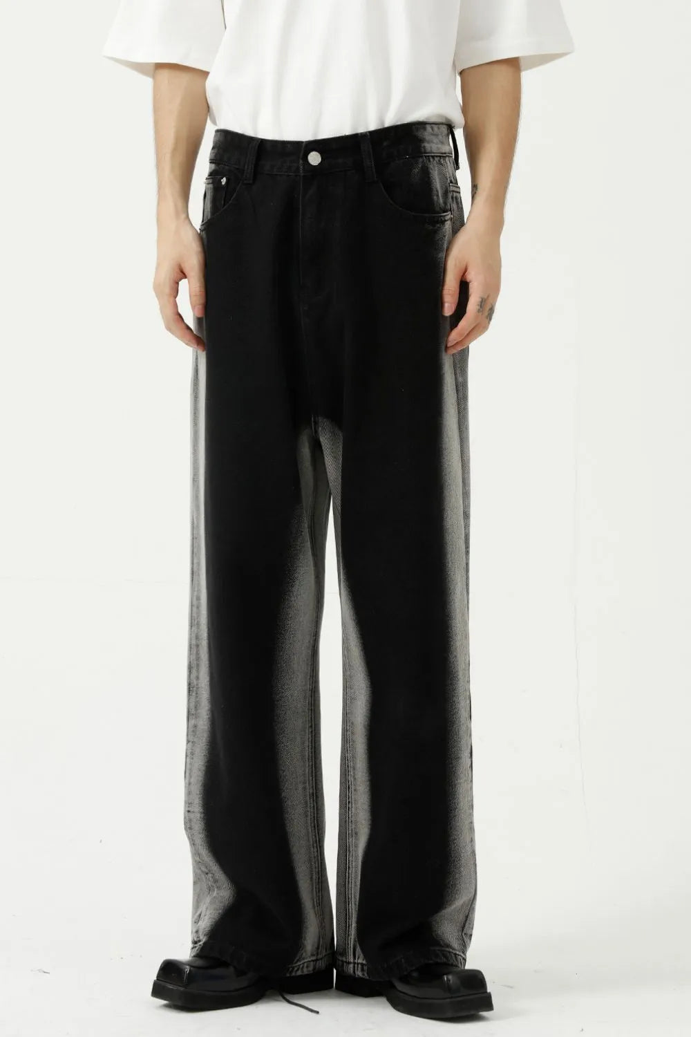 Faded side panel wide leg jeans in dark wash denim with a relaxed fit.