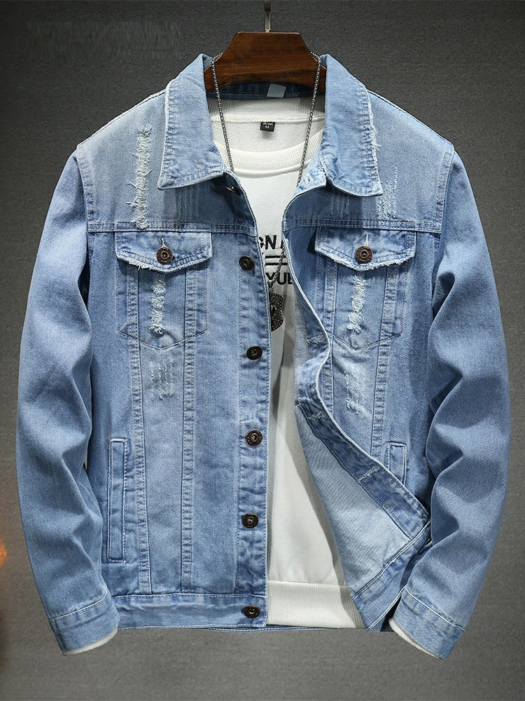 denim jacket in light blue featuring distressed and slim fit