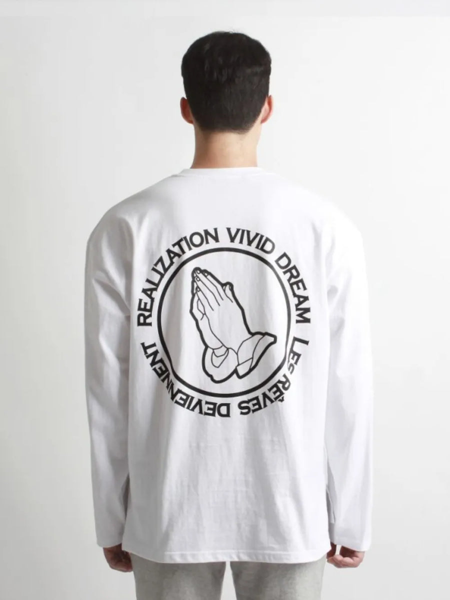 White long sleeve t-shirt with black praying hands graphic and text on back.