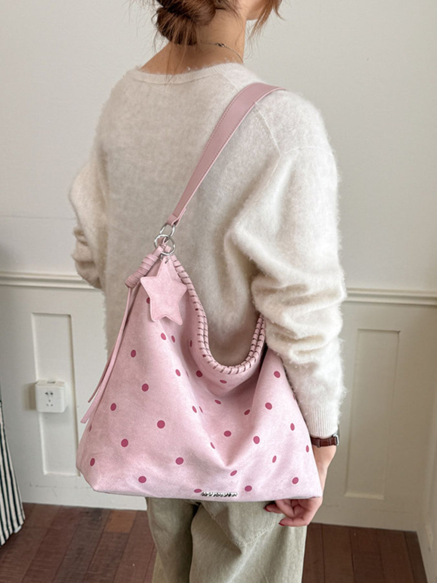 handbag in Pink with polka dot and shoulder strap