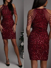 Burgundy sequin mini dress with beaded shoulder straps and bodycon fit.
