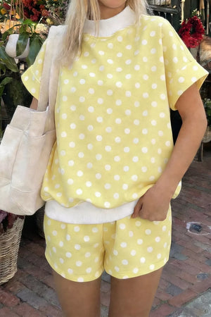 Charming polka dot top and shorts ensemble in Pastel Yellow.