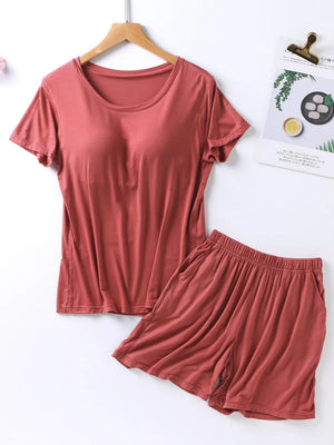 Cherry Pink two-piece pajama set with crew neck tee and drawstring shorts with pockets.